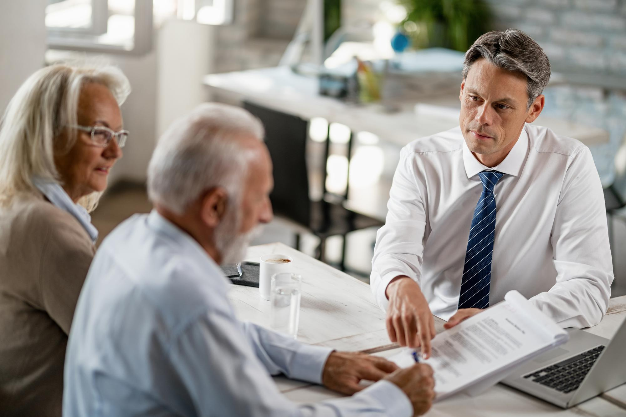NH attorney explaining power of attorney to elderly clients
